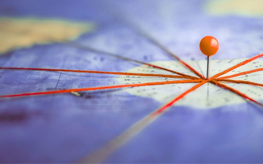 A map with a pin to signify the customer journey mapping process